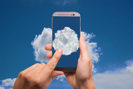 person taking photo using gray HTC One M8 smartphone thumbnail