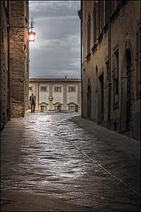 man walking on concrete road thumbnail