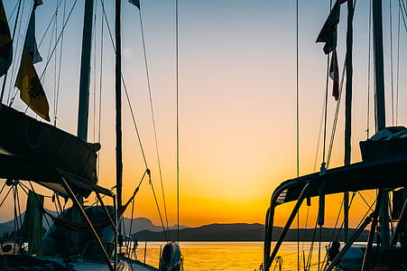 two boats sailing in body of water thumbnail