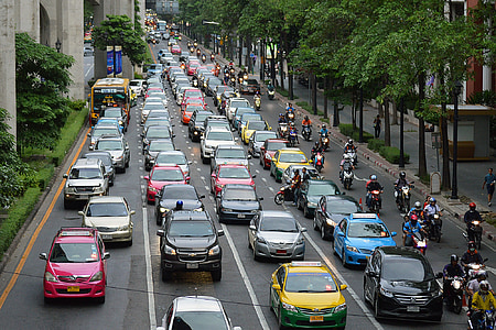 aerial photo of road with assorted cars thumbnail