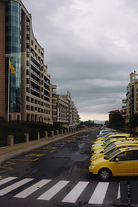 Parked Yellow Taxi Cab Waiting for a Fare thumbnail
