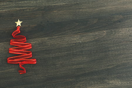 Holiday Ribbon Tree On Woodgrain Photo thumbnail