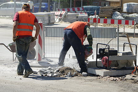 two men fixing the road thumbnail