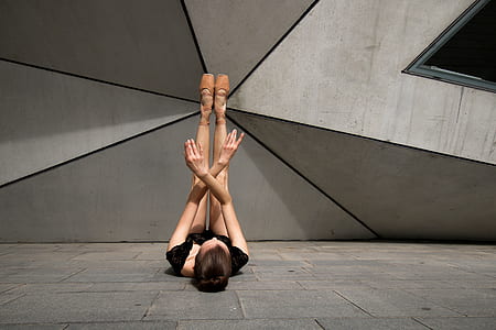 photo of ballerina laying on ground thumbnail