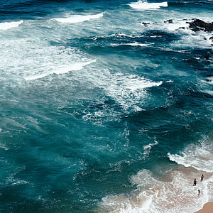 three person on seashore thumbnail