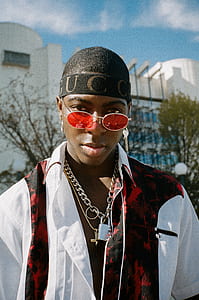 man wearing red sunglasses thumbnail