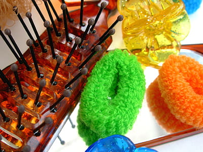 brown and black plastic hair comb thumbnail