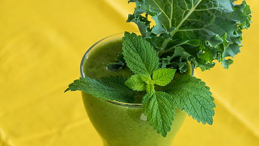 glass of matcha smoothie with mint leaves thumbnail