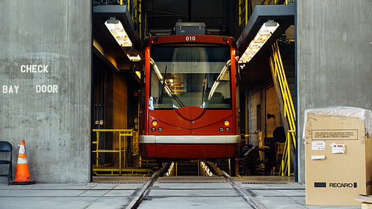 red train in station thumbnail