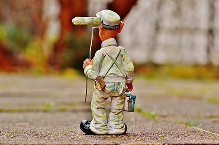 man holding paint can thumbnail