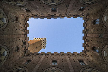 architectural photography of brown building thumbnail