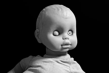 grayscale photo of infant doll thumbnail