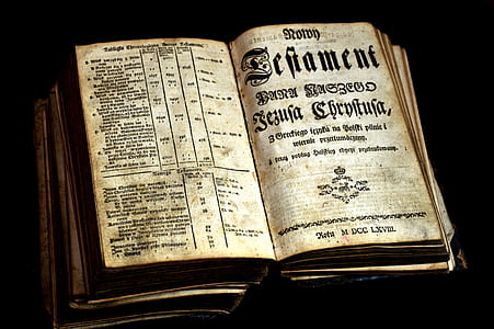 open book displaying old English prints thumbnail