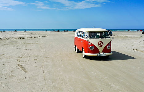 white and red Volkswagen van on road at daytime thumbnail