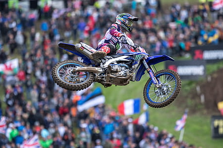 selective focus photography of motocross flying on air thumbnail