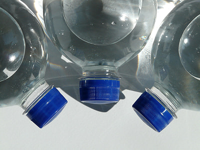 closeup view of three water bottles thumbnail