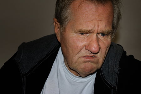 man wearing white shirt and black zip-up jacket thumbnail