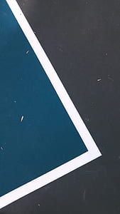 teal and white card on black board thumbnail