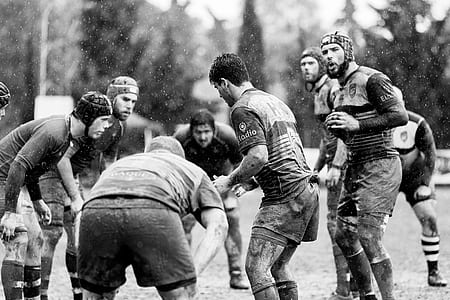 grayscale men playing rugby thumbnail