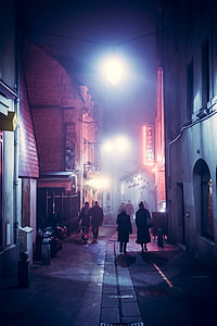 people walking near concrete buildings painting thumbnail