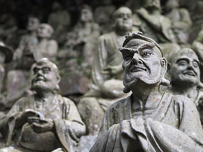 gray concrete statues thumbnail