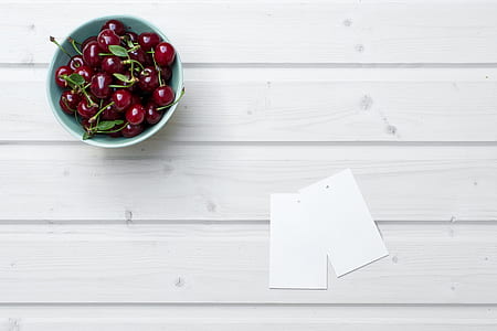 cherries in blue plastic bowl thumbnail