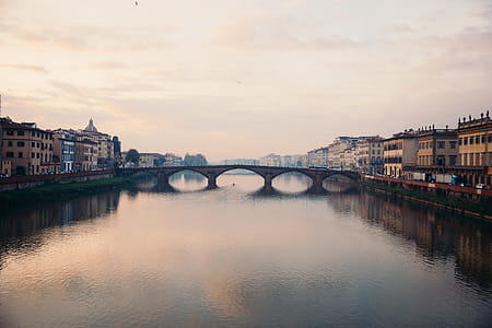 A bridge over Arno river in Florence, Italy at sunset thumbnail