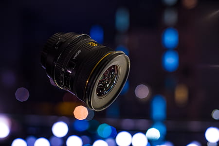 shallow focus photography of black DSLR lens thumbnail