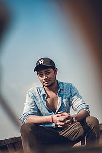 Man Wearing Black Baseball Cap thumbnail