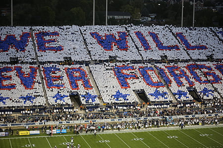 people at football stadium thumbnail