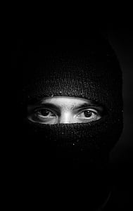 grayscale photography of man in balaclava thumbnail