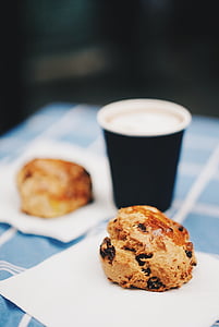 pastry on white table tissue near disposable cup thumbnail