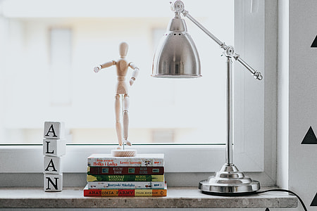 Wooden mannequin in various poses thumbnail