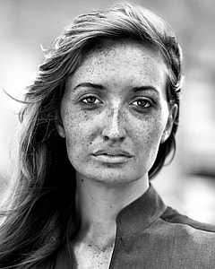 woman wearing shirt in gray scale photo thumbnail