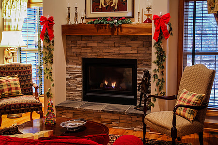 fireplace with Christmas season decor thumbnail