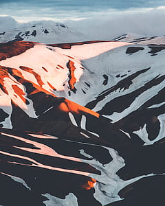 mountain covered snow during daytime thumbnail
