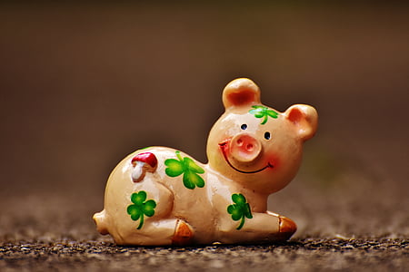 pink pig with 3-leaf clover print figurine thumbnail