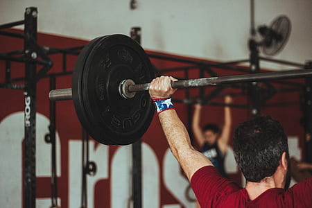 man holding barbell thumbnail