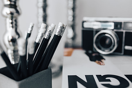 Pencils, magazines and an old lightbulb thumbnail