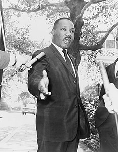 photo of Martin Luther King Jr. rising his right hand thumbnail