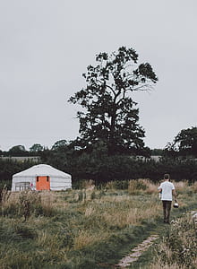 man walking on pathway thumbnail