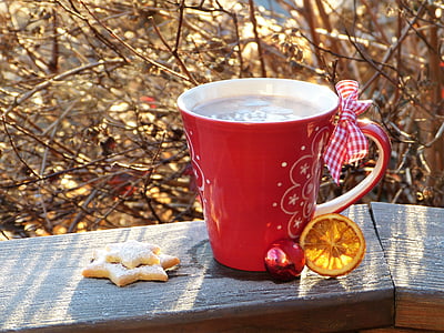 red and white ceramic mug on wooden plank thumbnail
