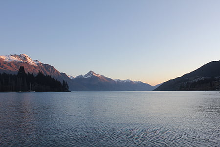 body of water near mountain thumbnail