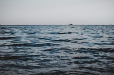 sea under cloudy sky during daytime thumbnail