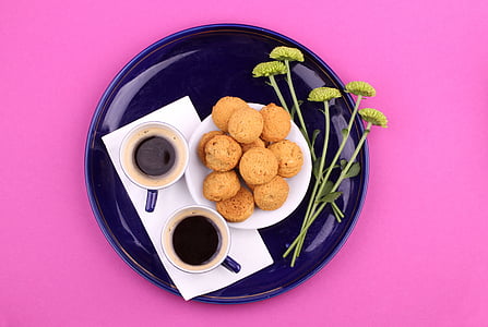baked cookies on saucer beside two cups thumbnail