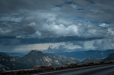 grey concrete road and mountains thumbnail