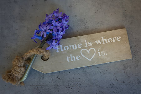 brown wooden quote board lying on gray concrete surface thumbnail