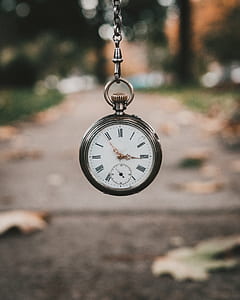 round gray analog pocketwatch at 2:49 thumbnail