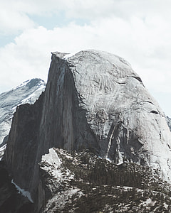gray rugged mountain under white cloudy sky at daytime thumbnail