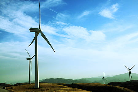 landscape photography of wind turbines thumbnail